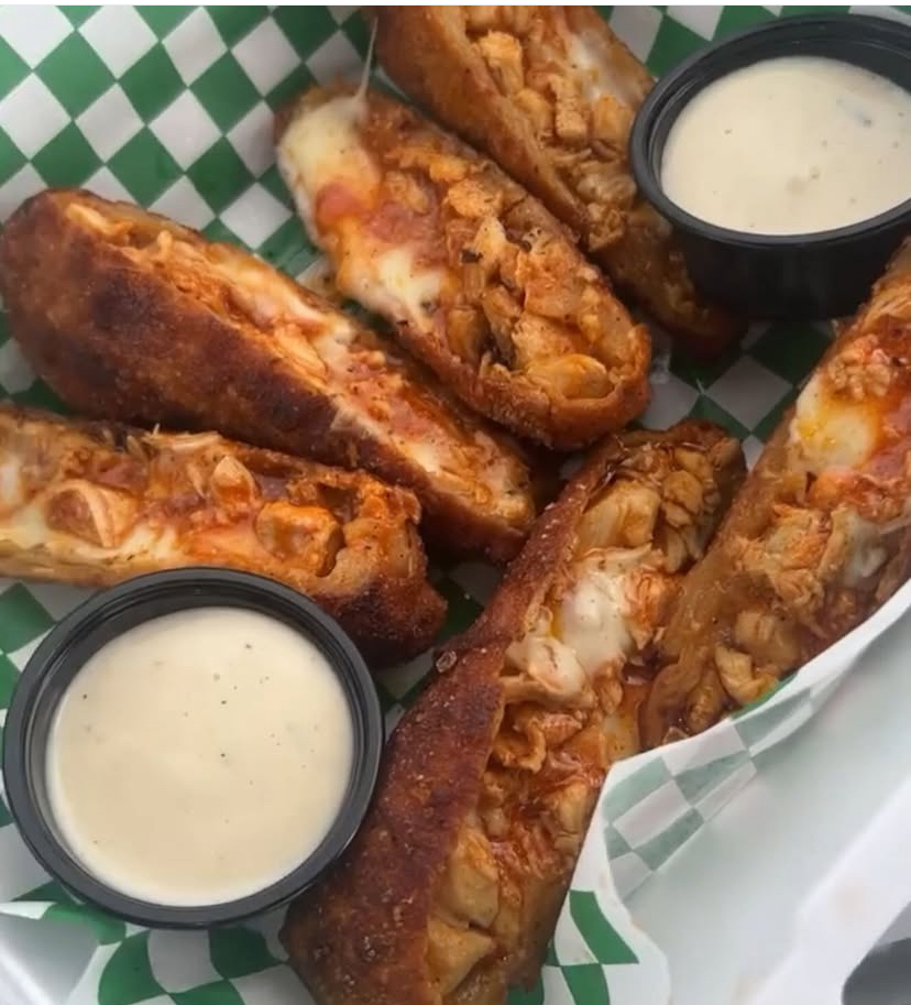 Buffalo chicken eggrolls with sauce